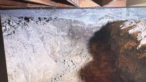 foundation-excavation Excavation work along a concrete foundation wall showing dirt removal for waterproofing or structural repair.